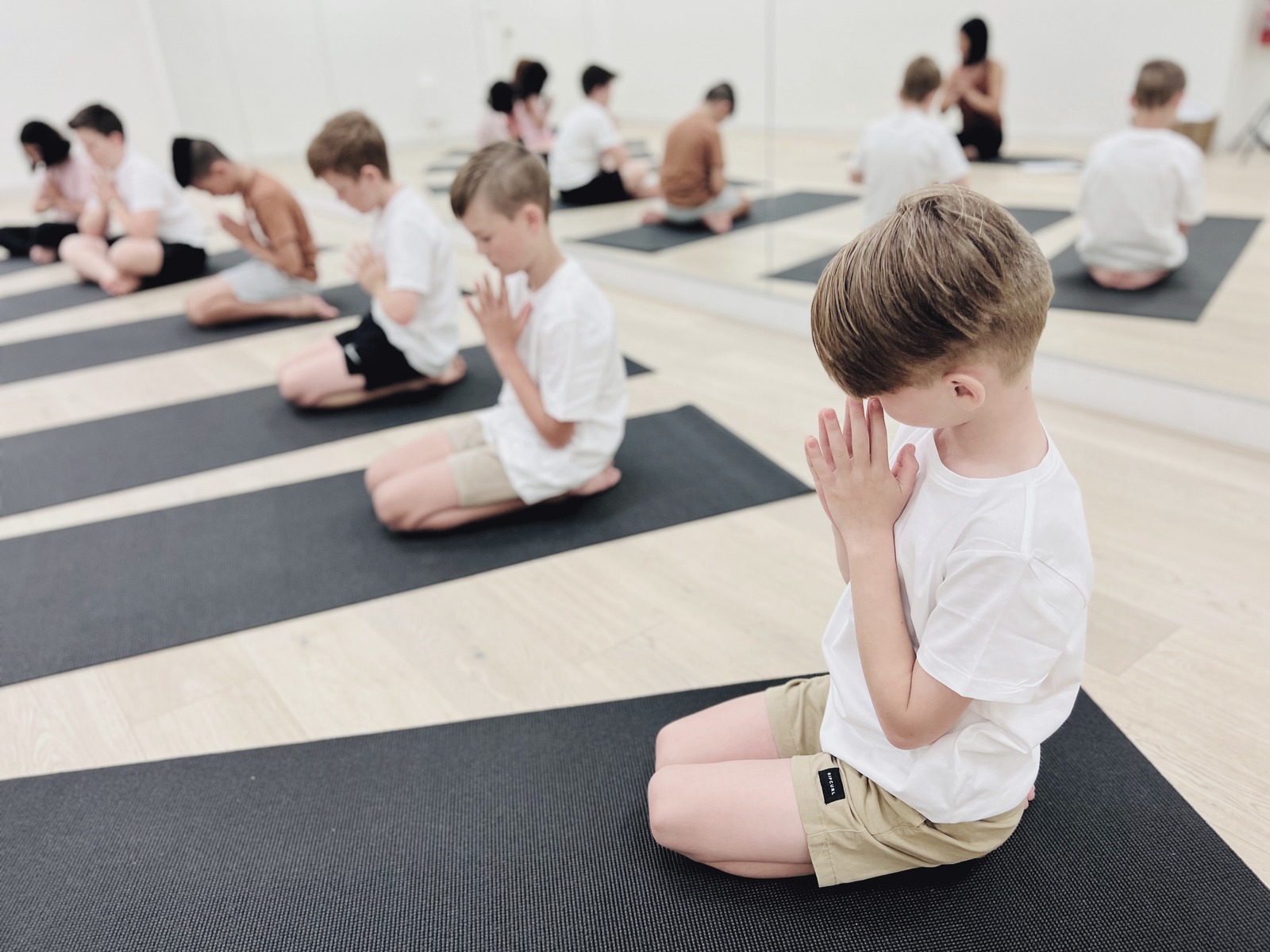 Children practising yoga